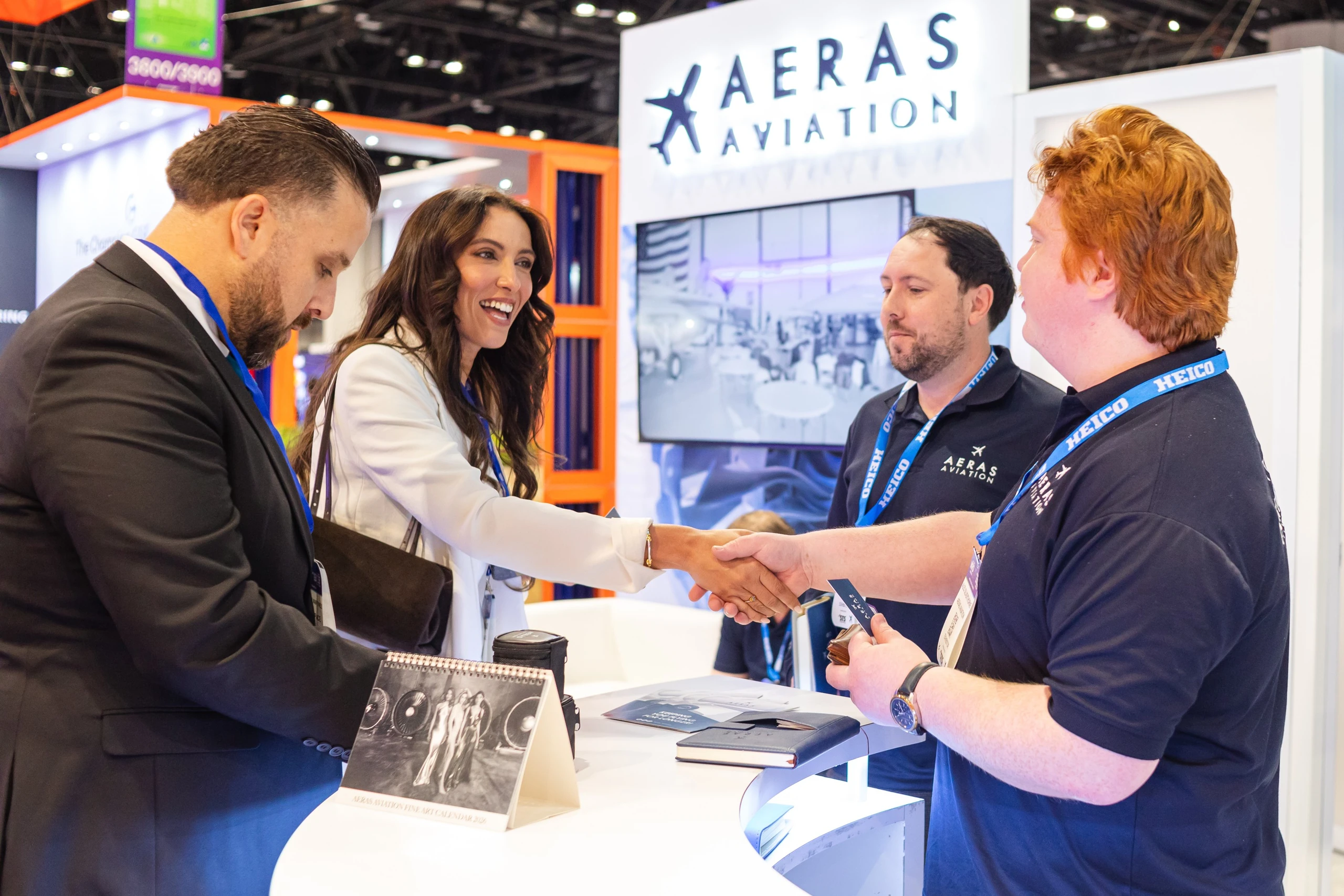 Aeras Aviation booth — TV displays and branding